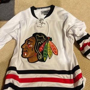 Woman’s Blackhawks jersey. No name!